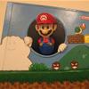 Mario poping out of the Wii